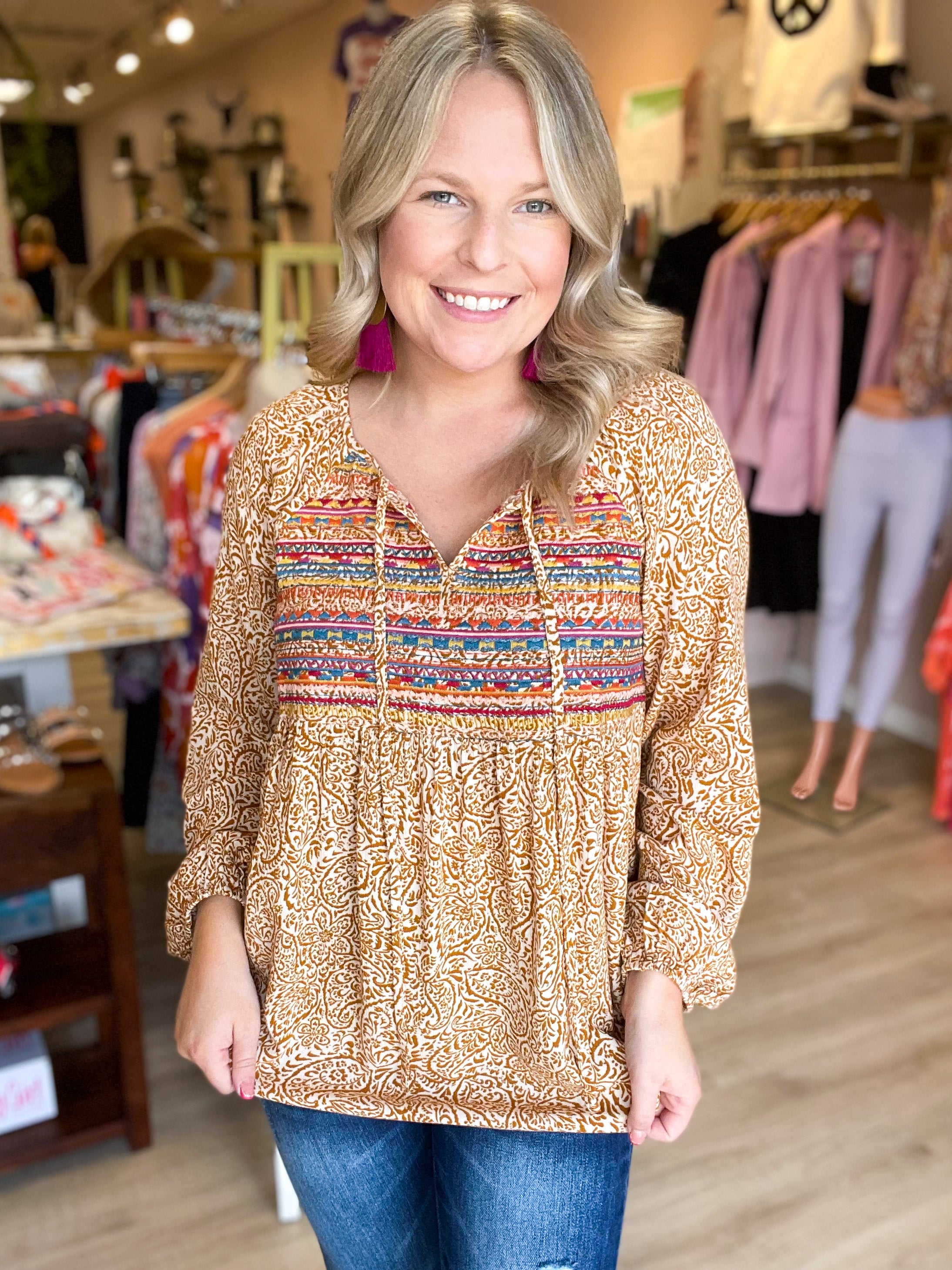 marigold pattern top with embroidered chest