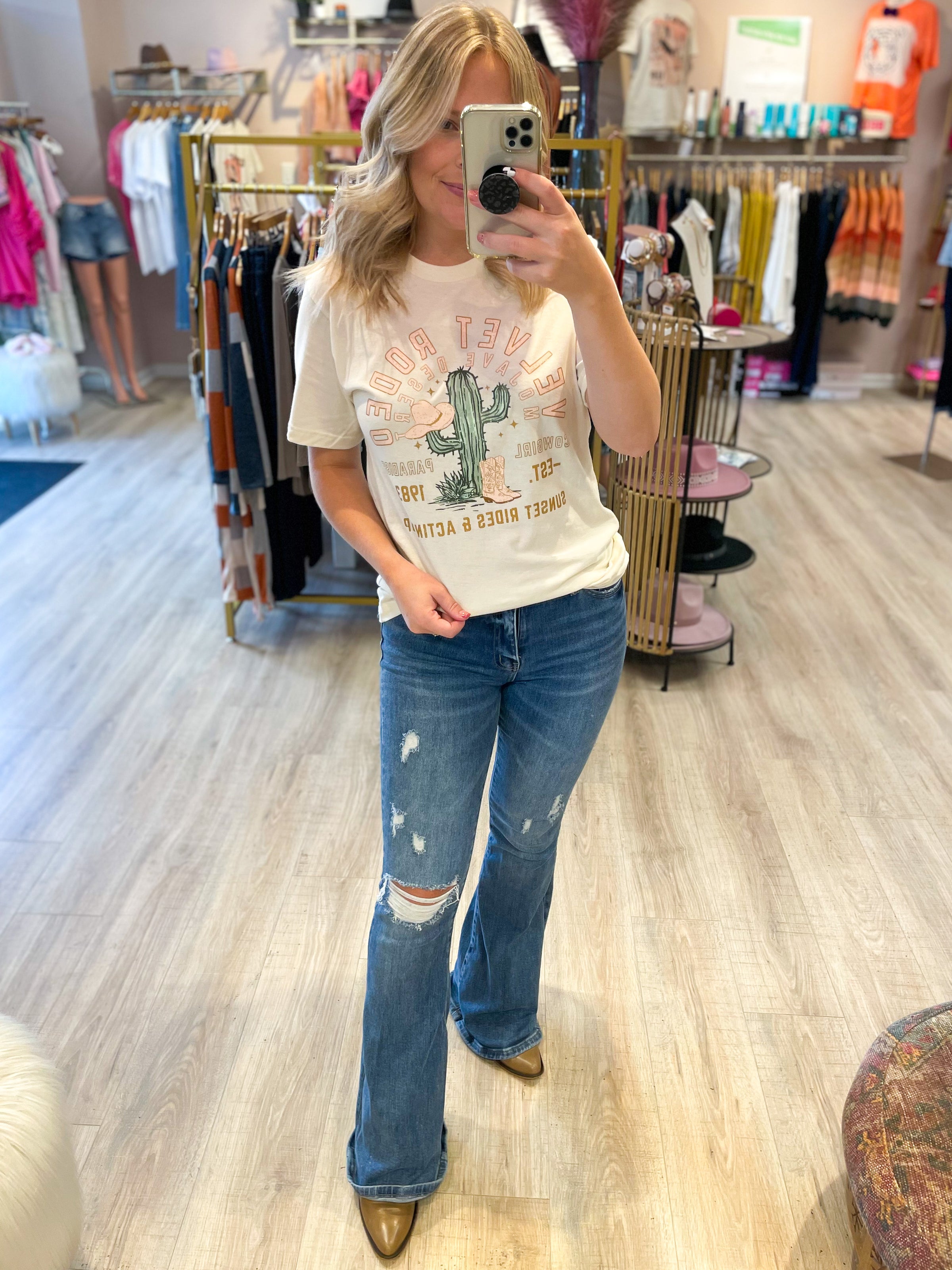 cream tee with velvet rodeo graphic