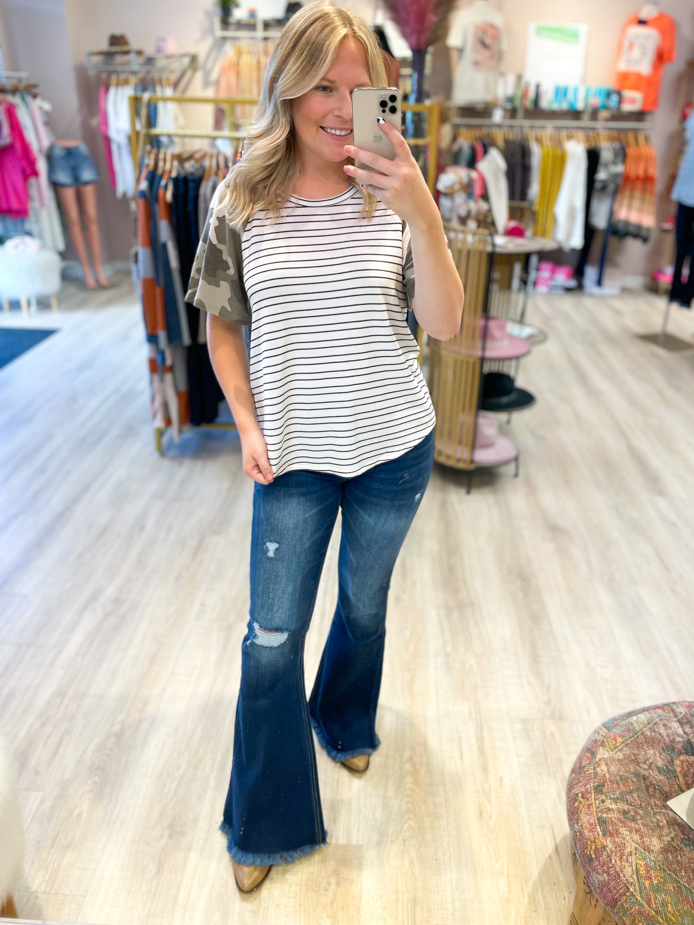 striped top with camo sleeves