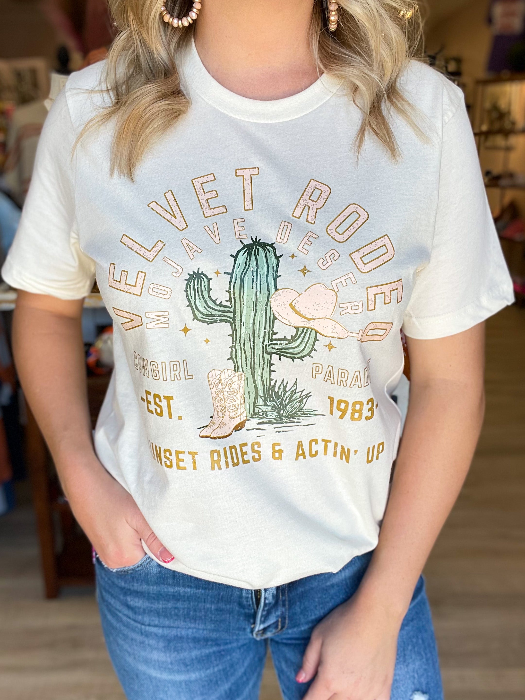 cream tee with velvet rodeo graphic