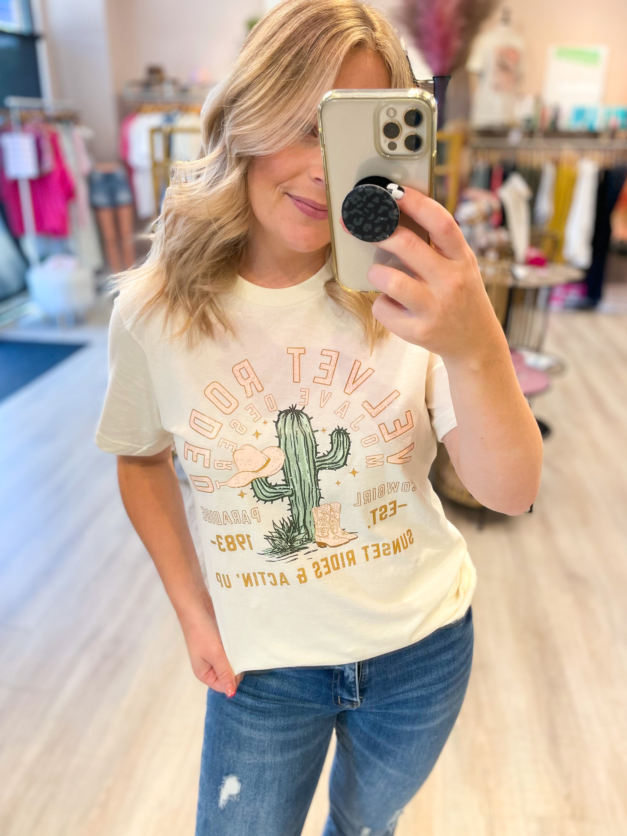 cream tee with velvet rodeo graphic